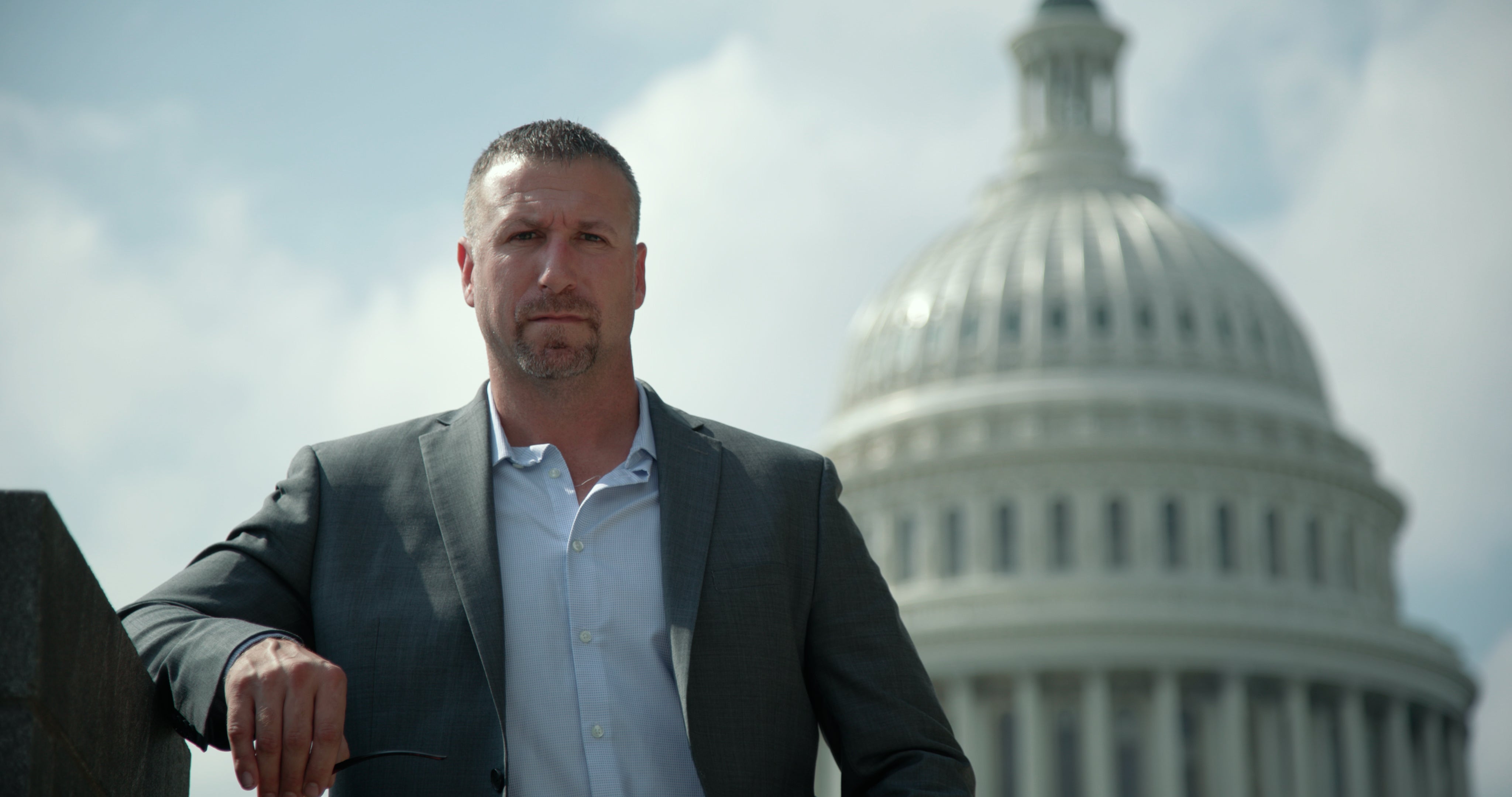 Gary Hess in a gray suit at the United States Capitol