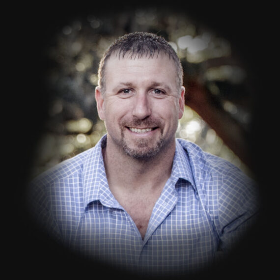 Gary Hess, smiling in warm natural light